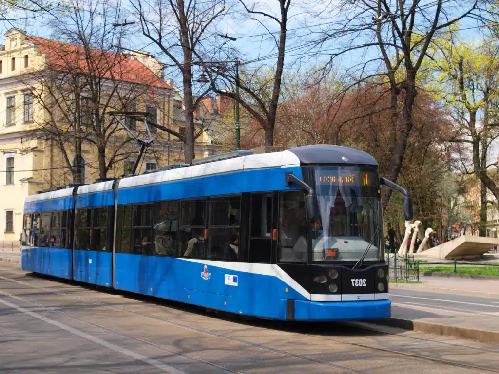 Modern tram operating regularly through the old town of Krakow